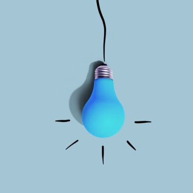 a light bulb on a blue background